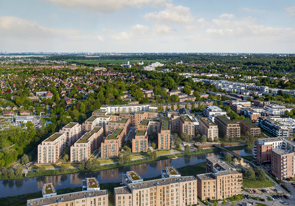 Vogelperspektive auf das Quartiersprojekt WEIDENBAUMS UFER in Hamburg mit moderner Architektur und urbaner Nutzung am Wasser.